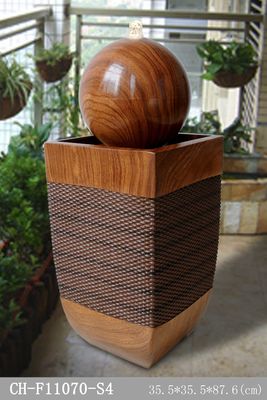 Fontana di legno bassa di effetto del rattan di ellisse fornitore