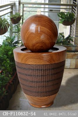Fontana di legno di effetto del rattan della base di ellisse della palla fornitore